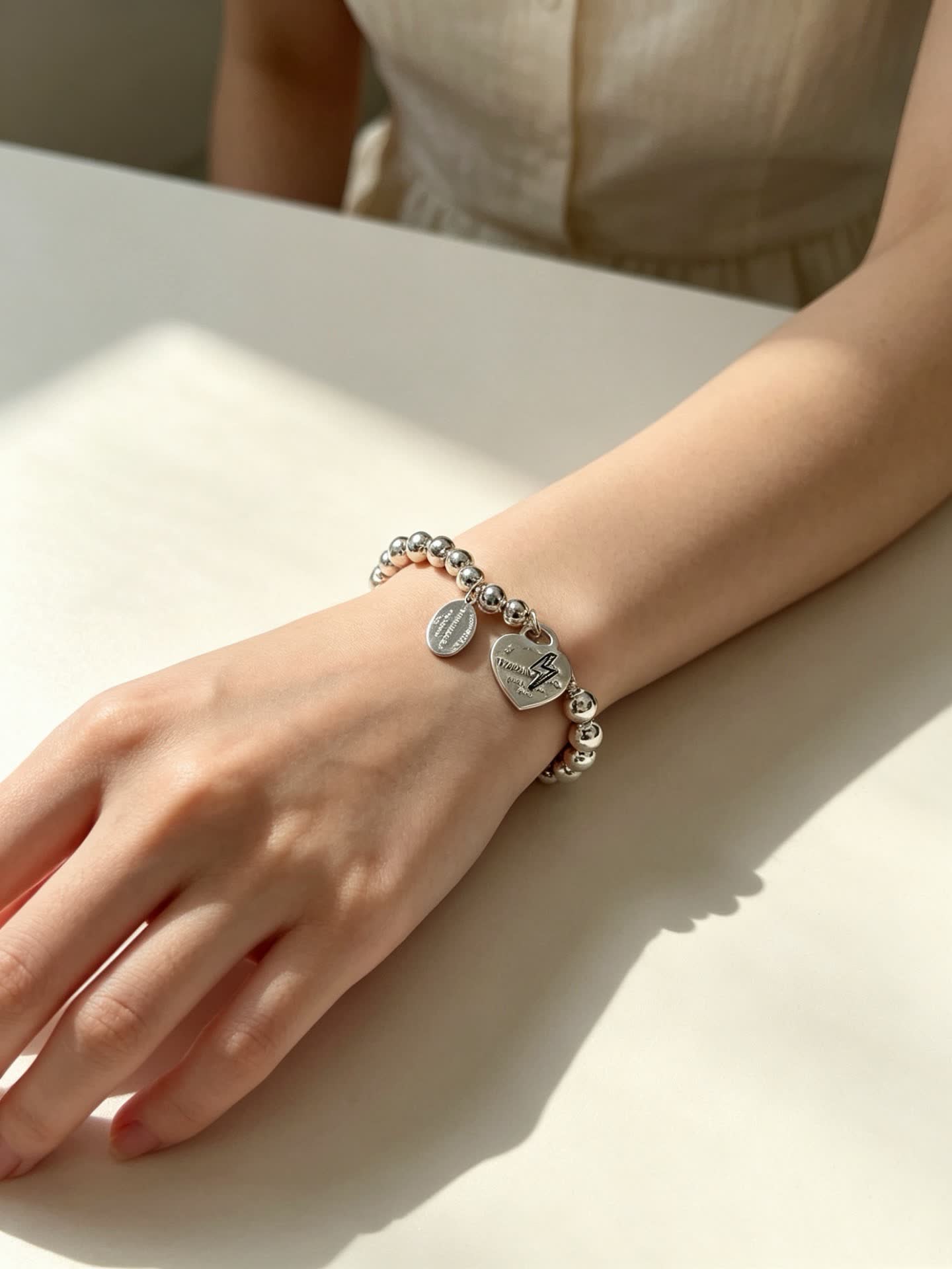 Tiffany & Co. Sterling Silver Bead Bracelet with Heart Tag